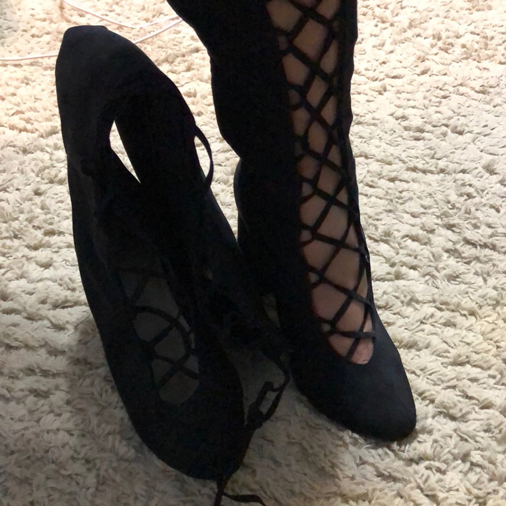 Strapped knee boots